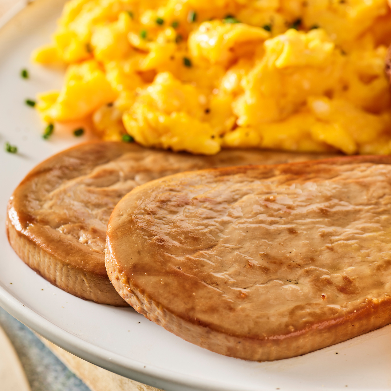 Scrambled eggs with meati breakfast patty